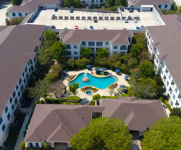 Aerial view of complex and pool